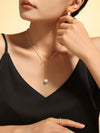 Kamilah Stainless Steel Bow Pendant Necklace with Pearls