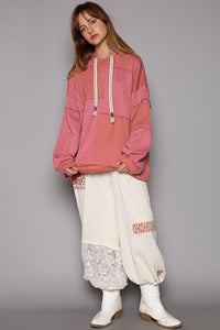 Remi Exposed Seam Hooded Knit Top