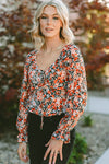 Ruby Floral Tied Flounce Sleeve Peplum Blouse